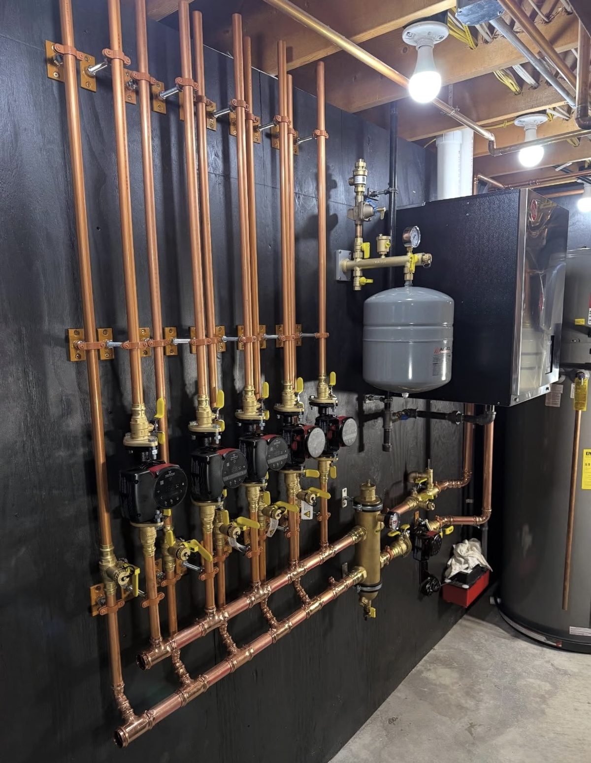 Multi-zone hydronic manifold in pro-press copper installed by Rescue